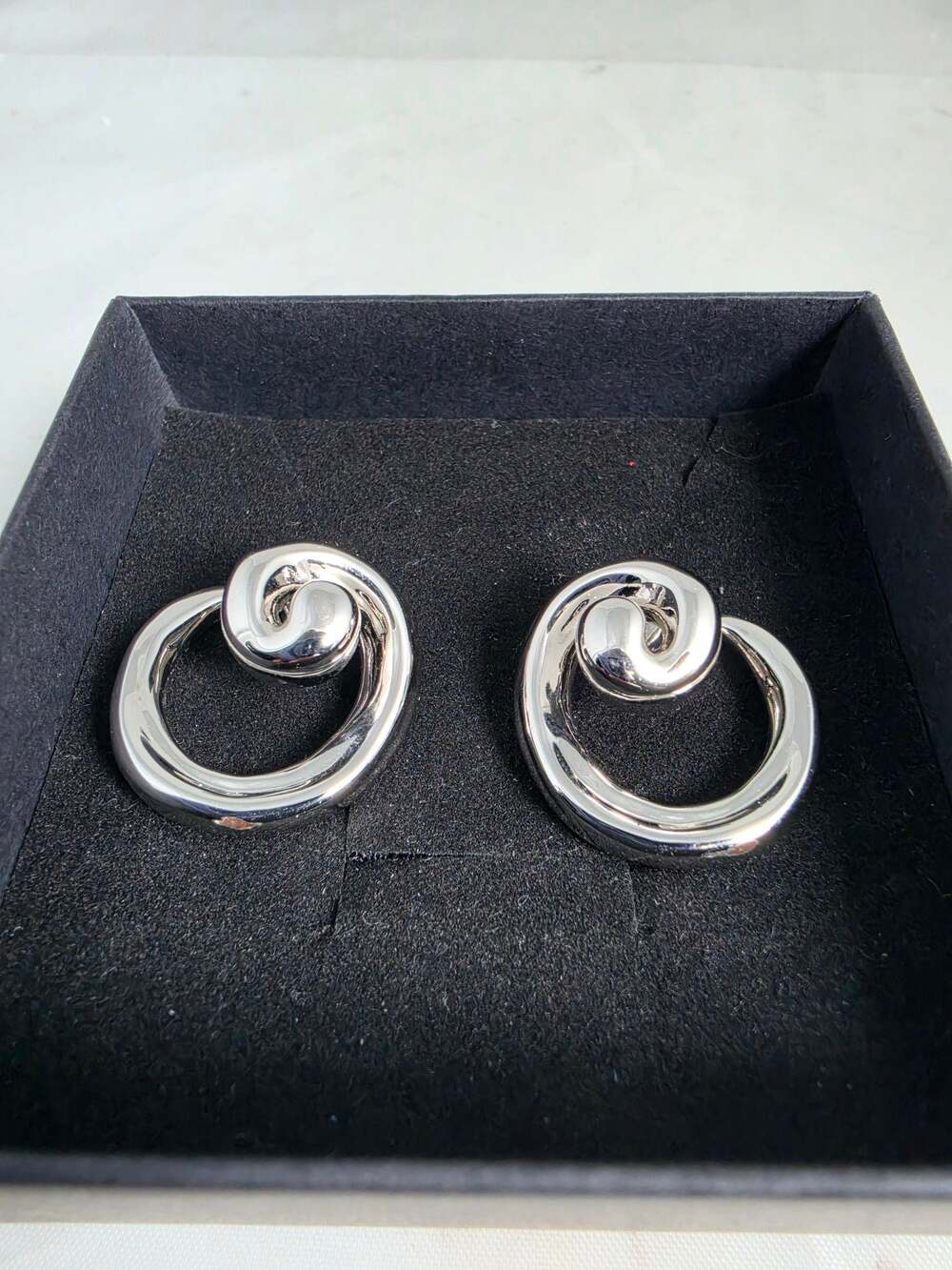LUVAJ Silver-Plated Spiral Loop Statement Earrings